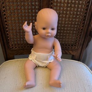 Cititoy baby doll with brown eyes and Velcro closure diaper, approx, 12 inches